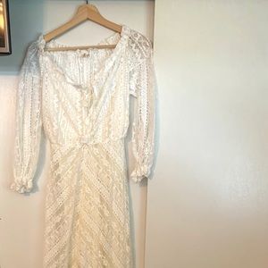 Grace ivory long lace dress from Maje .